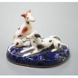 A Staffordshire porcelain group of two greyhounds, c.1835-50, 10.5 cm longProvenance: Dennis G.