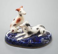 A Staffordshire porcelain group of two greyhounds, c.1835-50, 10.5 cm longProvenance: Dennis G.