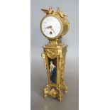 A French ormolu and Limoges enamel mantel timepiece, c.1900 - 31cm tall