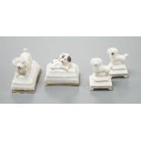 Four Staffordshire porcelain toy models of poodles and a King Charles spaniel puppy, c.1835-50,