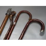 A silver mounted George V walking cane dated:London 1919 and 3 other canes,Silver mounted cane 92