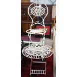 An oval painted metal folding garden table, length 74cm, depth 56cm, height 69cm and a chair