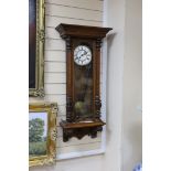 An early 20th century Vienna type wall clock