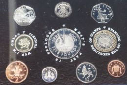 Twelve cased Royal Mint UK proof coin year sets 2000-2008 and 2010-2011, including 2000 x 2.