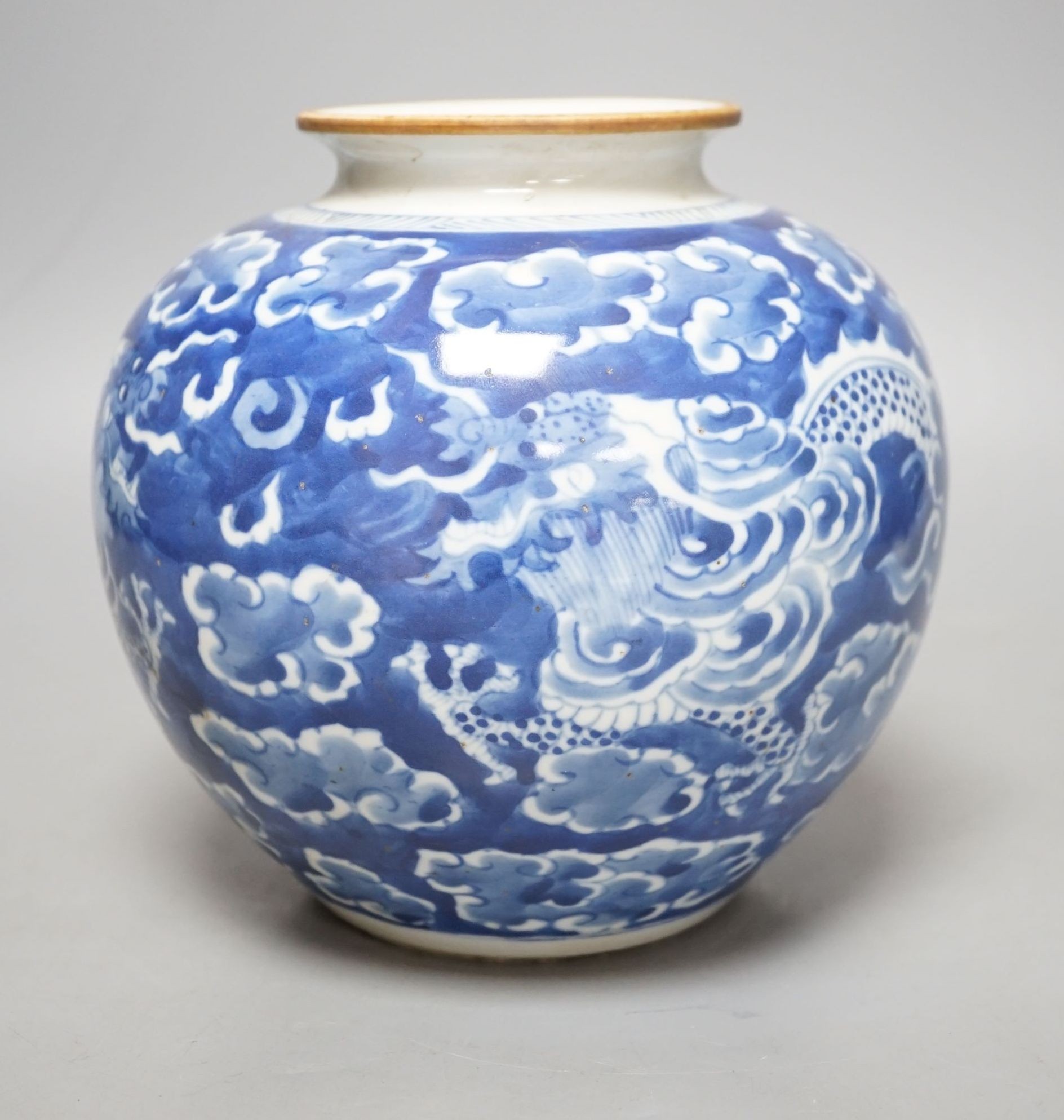 A Chinese blue and white ‘dragon’ globular vase,17cms high.