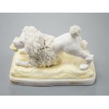 A Samuel Alcock model of a poodle grasping a bone, c.1835–50, 11.1 cm long,Cf. Dennis G.Rice Dogs in