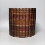 A ‘Royal Academy Pictures’ faux book spine waste paper bin, 22cm diameter.