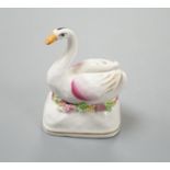 A Staffordshire porcelain model of a swan, c.1835-50, on a mound base, 5.4 cm highProvenance: Dennis