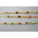 A modern Thai yellow metal and oval multi gem set necklace, 68cm and a similar bracelet, stamped