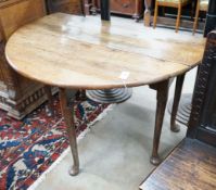 A George III provincial oak drop leaf pad foot dining table, length 120cm extended, width 120cm,