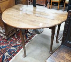A George III provincial oak drop leaf pad foot dining table, length 120cm extended, width 120cm,