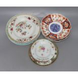 A collection of Chinese 19th and 20th century plates, together with Japanese Imari plates.