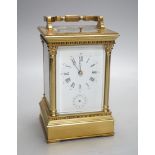 A large late 19th century brass carriage clock with alarm, and push repeat15 cms high.