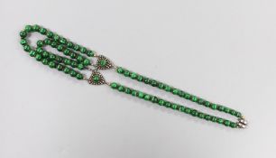 A 20th century Chinese single/double strand malachite bead necklace, with white metal clasp and