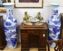 A pair of massive Chinese blue and white vases, 142cm