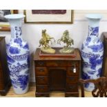 A pair of massive Chinese blue and white vases, 142cm