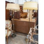 Two brass standard lamps, larger including shade height 165cm