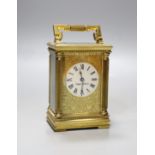 A French brass carriage timepiece, Mappin & Webb,11.5 cms high.