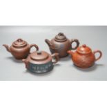 A group of four Yixing pottery teapots - tallest 11cm
