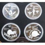 Seven cased 1976 Olympiad Montreal sets containing proof silver 5 dollar (x2) and 10 dollar (x2)