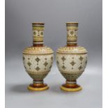 A pair of late 19th century Mettlach vases,26 cms high.