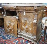 A 19th century Flemish carved oak buffet, length 140cm, depth 55cm, height 110cm