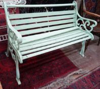 A Victorian style painted cast iron slatted garden bench, in need of restoration, length 128cm,