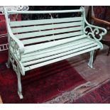 A Victorian style painted cast iron slatted garden bench, in need of restoration, length 128cm,