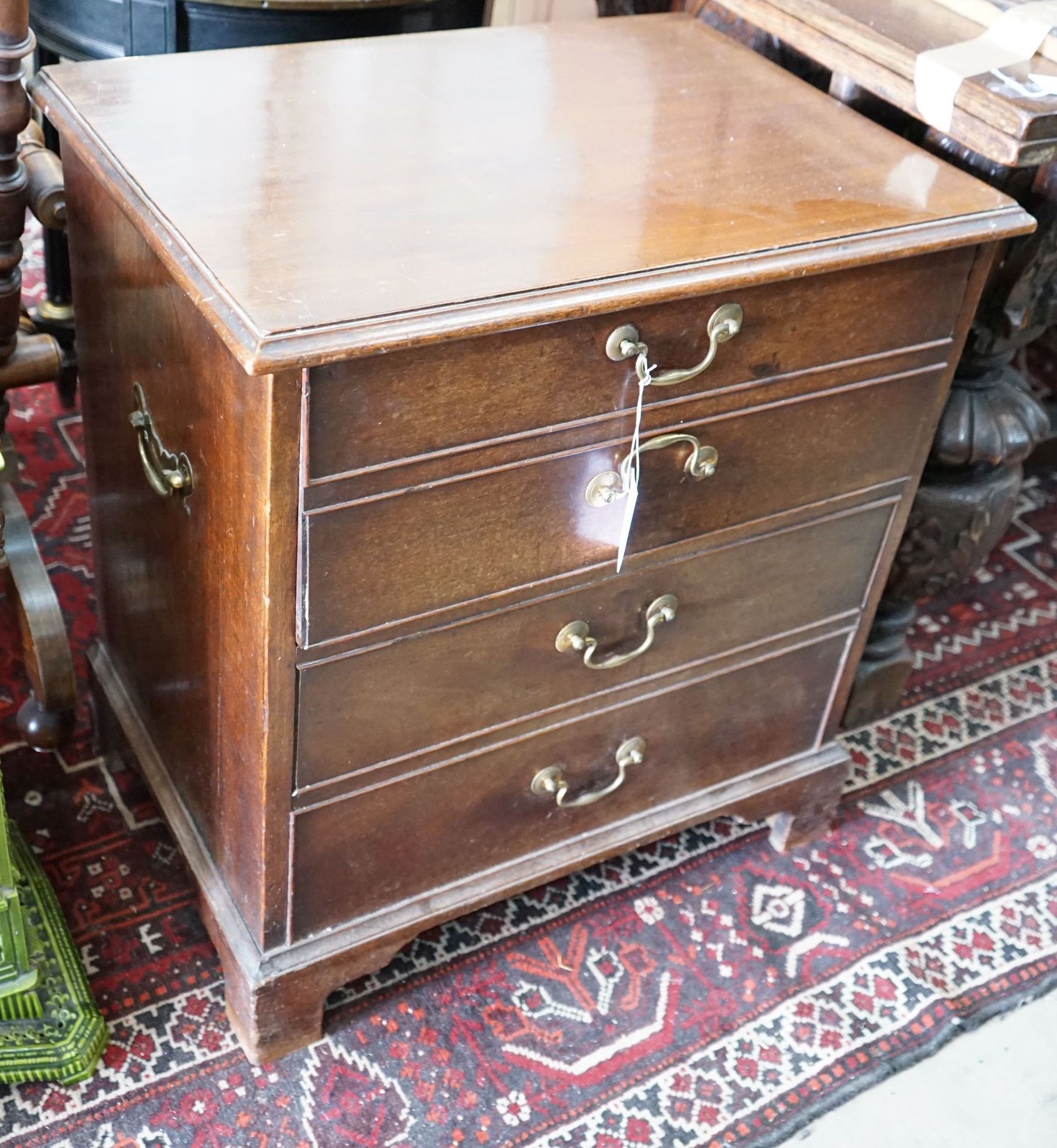 A 19th century mahogany hinged top commode with dummy drawer front, width 65cm, depth 47cm, height