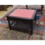 A 19th century Indian carved ebony stool, length 56cm, depth 46cm, height 40cm