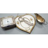 A 19th century gilt heart-shaped frame, A Japanese sterling figural spoon, a 1930's silver cream jug