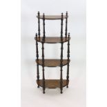 A late Victorian inlaid walnut D shaped four tier whatnot, width 59cm depth 28cm height 129cm