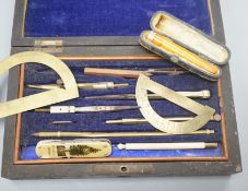 A Victorian draughtsman's set, a gold mounted amber cigar holder and a pocket knife, bone handle