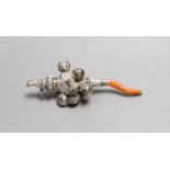 A late Victorian silver baby’s rattle, with bells, whistle and coral teether, Hilliard &