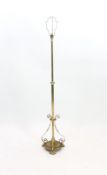 An Edwardian brass telescopic lamp standard
