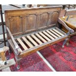 A George III oak settle, length 148cm, depth 60cm, height 106cm