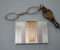 A white and yellow metal (stamped silver 9ct) compact and a pair of tortoiseshell mounted