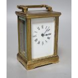 A French brass carriage timepiece,11cms high.