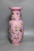 A large Chinese pink ground ‘Hundred Antiques’ vase,49 cms high.