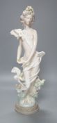 A Lladro female figurine, decorators signature on base, No 40141 cms.