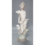 A Lladro female figurine, decorators signature on base, No 40141 cms.