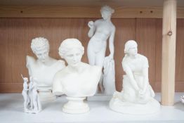 Two parian busts, a classical figure, another seated figure and a miniature three graces group -
