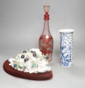 An etched ruby glass decanter, a Chinese blue and white sleeve vase and a continental ceramic basket