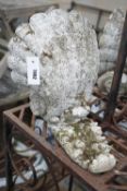 A pair of reconstituted stone scallop shell garden wall pockets, width 29cm, depth 30cm, height