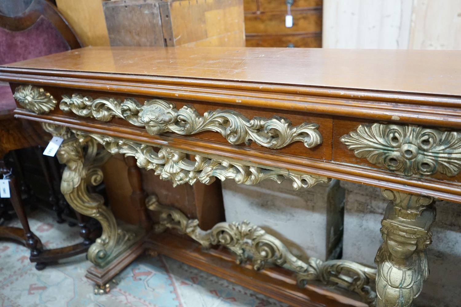 An 18th century style parcel gilt mahogany console table, width 136cm, depth 36cm, height 91cm - Image 2 of 3