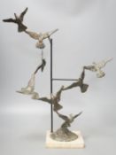 A bronze bird group, ‘Flight’ ‘97, signed Hayter,55.5 cms high.