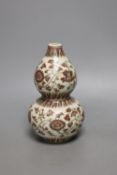 A Chinese underglaze copper red double gourd vase,18cm high.