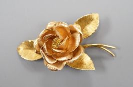 A 1960's 18ct gold brooch, modelled as a rose, maker T&D, 54mm, 11.3 grams.