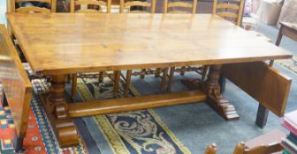 A good 18th century style Belvedere Furniture rectangular light oak refectory dining table, with end