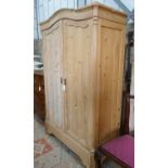 A 19th century East European 'knockdown' pine wardrobe, length 130cm, depth 58cm, height 198cm